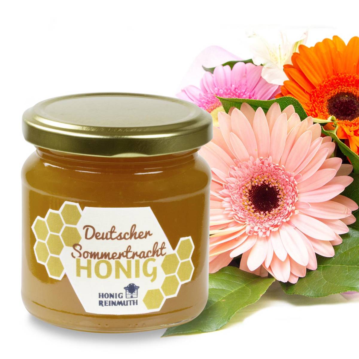 Sommertracht-Honig im Glas vor Sommerblüten