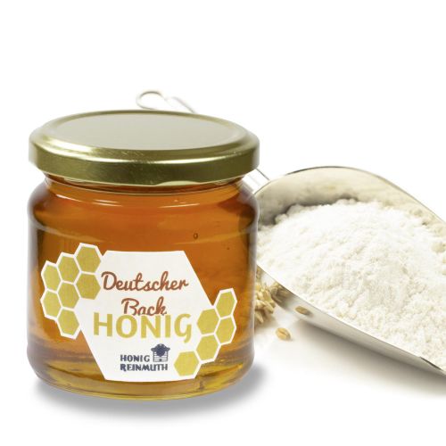 Deutscher Backhonig im Glas mit Mehl, Butter und Eiern